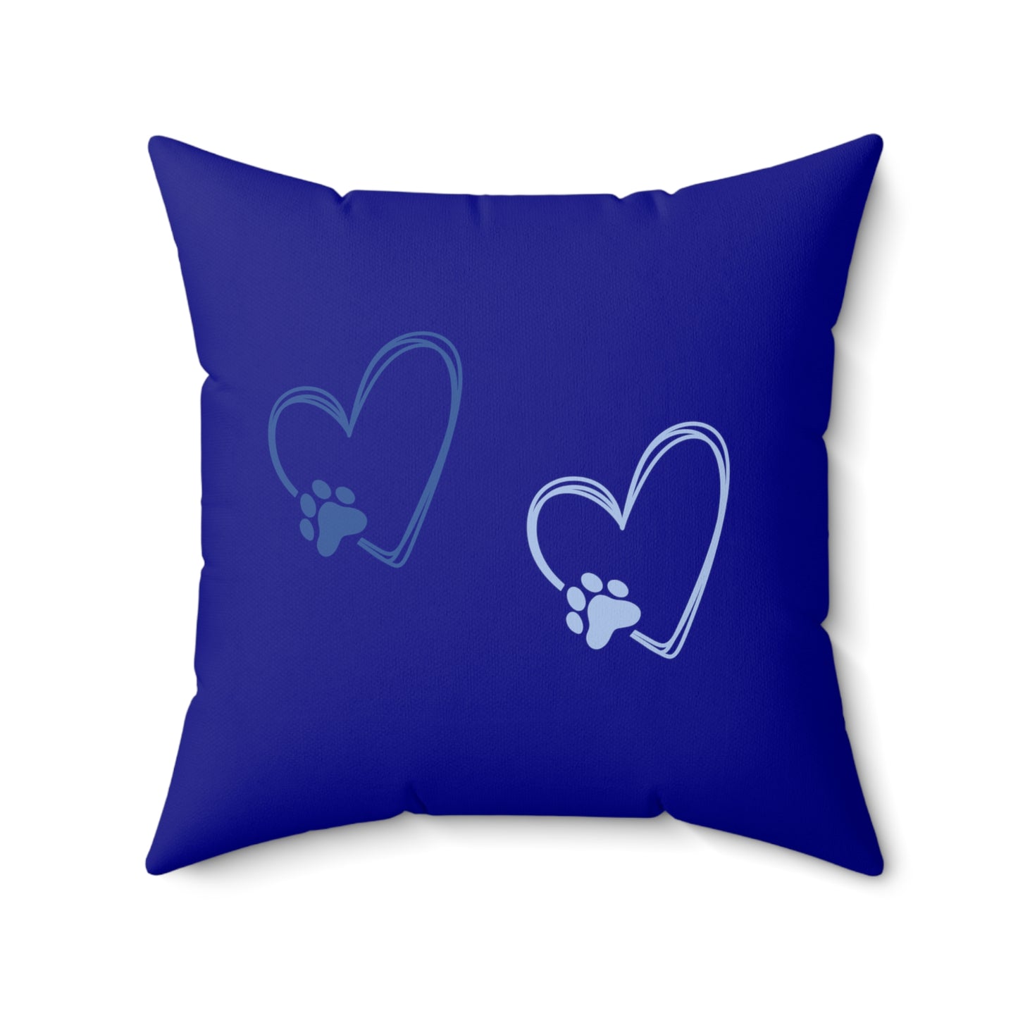 Dark blue square pillow with light and navy paw print hearts, minimal background