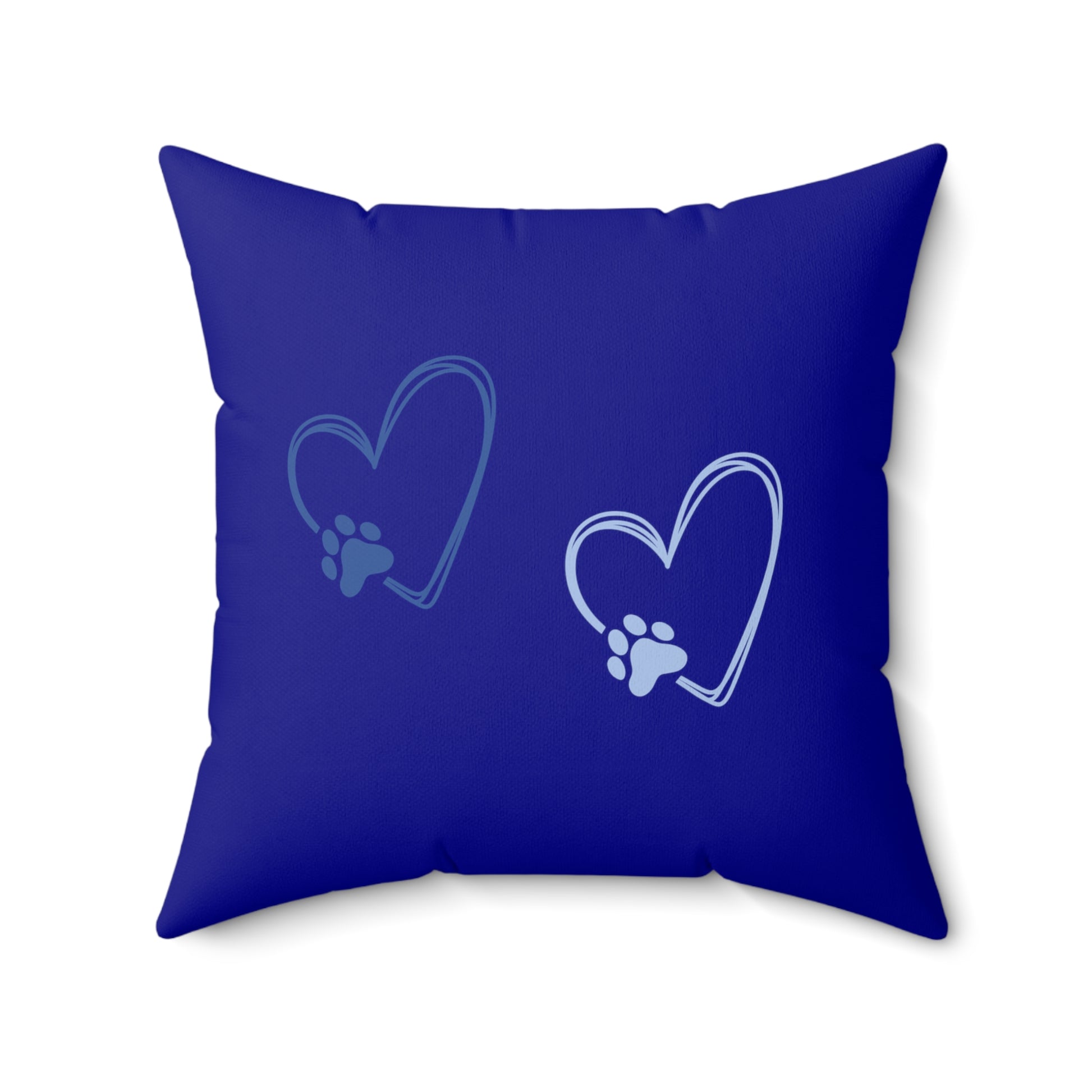 Dark blue square pillow with light and navy paw print hearts, minimal background
