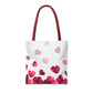 Side view of heart-themed tote bag with cartoon Maltese dog and red hearts