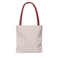 Plain pastel grey tote bag with red handles, no design