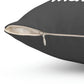 Close-up of concealed zipper on grey quote pillow showing cream-colored insert